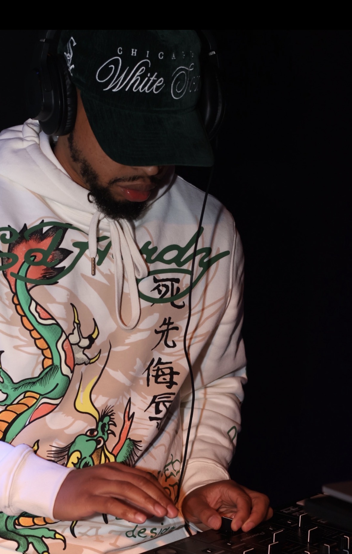 DJ Jay Jefe mixing on the decks